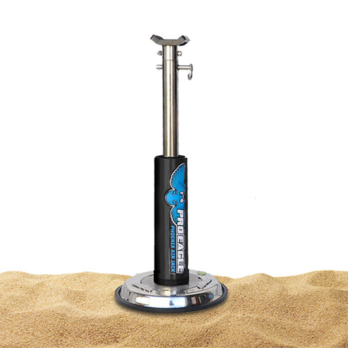 Phoenix CO2 Air Jack mounted on an 8" sand base, displayed on sandy surface.